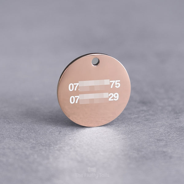 Rund ID-bricka till hund och katt, i roséguld, graverad med 2 telefonnummer