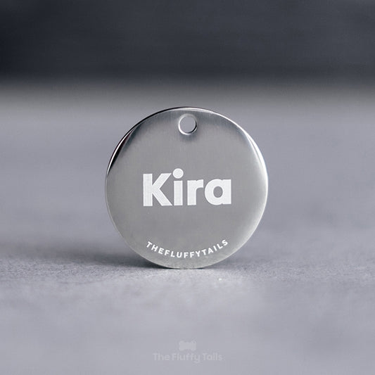 Rund silvrig namnbricka