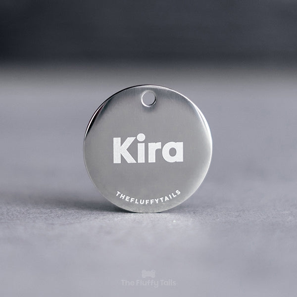 Rund silvrig namnbricka