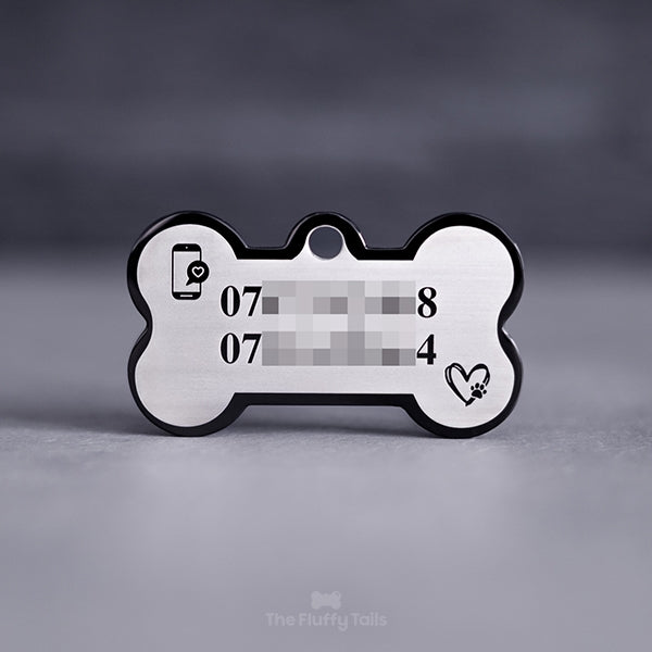 Hundbensformad, svart ID-bricka, hundnamnbricka för hund och katt med personlig gravyr och egen design, graverad med telefonnummer och ikoner av en smartphone och hjärta och tass.