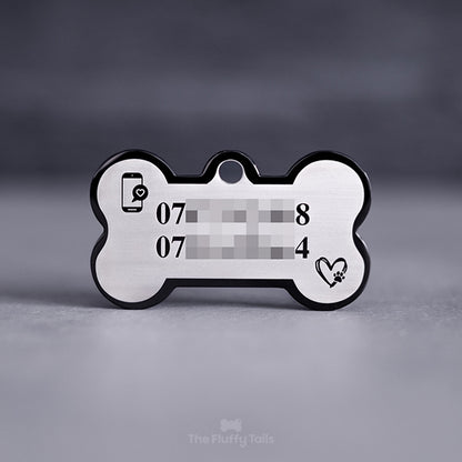 Hundbensformad, svart ID-bricka, hundnamnbricka för hund och katt med personlig gravyr och egen design, graverad med telefonnummer och ikoner av en smartphone och hjärta och tass.