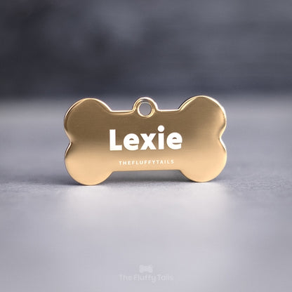 Hundbensformad ID-bricka, namntag, namnskylt, tillverkad av rosttfritt stål, med personlig gravyr, graverad med hundens namn och ägarens telefonnummer på baksidan. Passar både hund och katt.