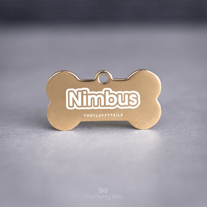Graverad hundbricka i guld av rostfritt stål med namn, personlig namnbricka för hund i benform.