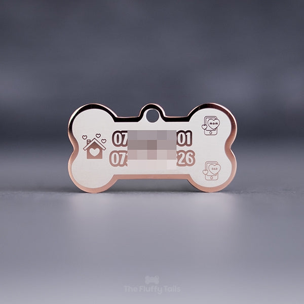 Hundbensformad ID-bricka för hund och katt i rostfritt stål i färgen roséguld med två telefonnummer och ikoner av telefon och hus med hjärtan