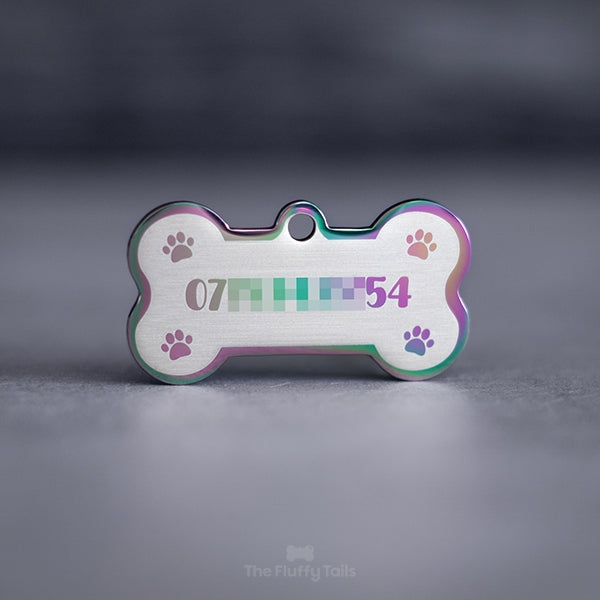 Hundbensformad ID-bricka i pastelfärger med telefonnummer och 4 tassikoner
